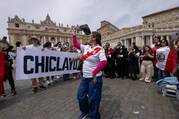 Peruvians celebrate as they join the pope for the 'Regina Coeli' prayer in St. Peter's Square at the Vatican on May 11, 2025. (CNS photo/Pablo Esparza)