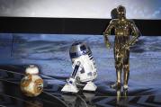 Upstaged? Droid characters from "Star Wars," BB-8, from left, R2-D2, and C-3PO speak at the Oscars on Sunday, Feb. 28, 2016, at the Dolby Theatre in Los Angeles. (Photo by Chris Pizzello/Invision/AP)