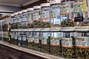 Jars of medical marijuana on display on at the Western Caregivers Medical dispensary in Los Angeles. (AP Photo/Richard Vogel, File)