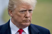 President Donald Trump takes a question from reporters before boarding Marine One on the South Lawn of the White House in Washington, Friday, Feb. 23, 2018, to travel to Oxon Hill, Md. to speak at the Conservative Political Action Conference (CPAC). (AP Photo/Andrew Harnik)