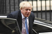 British Prime Minister Boris Johnson returns to Downing Street in London on Sept. 25. (AP Photo/Matt Dunham)