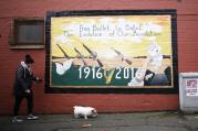 A Republican mural in West Belfast on March 2. A historic vote has upended the political landscape in Northern Ireland. (AP Photo/Peter Morrison)