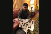 Sanctuary-city activist Felix Cepeda of New York City is seen during the first day of the U.S. bishops' fall general assembly in Baltimore on Nov. 13. He planned to pray and fast for the next three days in hopes the Catholic Church would offer its church properties as places of sanctuary to keep families intact if a family member faces deportation. (CNS photo/Rhina Guidos)