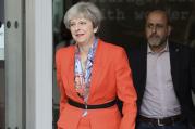 Prime Minister Theresa May leaves BBC studios in London after appearing on a morning show Sunday April 30, 2017. Britain goes to the polls for a General Election on upcoming June 8. ( John Stillwell/PA via AP)