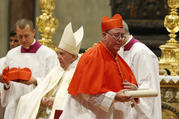 New Cardinal Jean-Claude Hollerich of Luxembourg carries his scroll after being made a cardinal by Pope Francis during a consistory in St. Peter's Basilica at the Vatican Oct. 5, 2019. (CNS photo/Paul Haring)