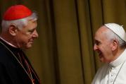 Cardinal Gerhard Müller greeting Pope Francis during the 2014 synod on the family. (CNS photo/Paul Haring)