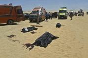 This image released by the Minya governorate media office shows bodies of victims killed when gunmen stormed a bus in Minya, Egypt, Friday, May 26, 2017 (Minya Governorate Media office via AP).