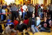 Activists with the March to Springfield hold a protest and rally outside the governor's office at the Capitol in Springfield, Ill. Tuesday, May 30, 2017. (Rich Saal/The State Journal-Register via AP)