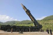 North Korean leader Kim Jong Un, second from right, inspects the preparation of the launch of a Hwasong-14 intercontinental ballistic missile (ICBM) in North Korea's northwest. (Korean Central News Agency/Korea News Service via AP, File)