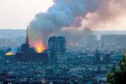 A major fire at Notre Dame Cathedral in Paris this past April left many readers asking, “Where was God?” (AP Photo/Rafael Yaghobzadeh)