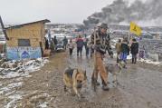 Jasper Spillman, of Lawrence, Kan., joins others departing from the "water protectors" main camp on Feb. 22, 2017, near Cannon Ball, N.D. (Tom Stromme/The Bismarck Tribune via AP)