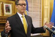 Kansas Gov. Sam Brownback speaks during a news conference at the Statehouse in Topeka, Kan., June 7 (AP Photo/John Hanna).