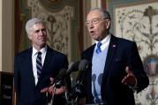 Supreme Court Justice nominee Neil Gorsuch listens at left as Senate Judiciary Committee Sen. Chuck Grassley, R-Iowa speaks on Capitol Hill in Washington, Wednesday, Feb. 1, 2017. (AP Photo/Jose Luis Magana)