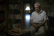 Amos Oz listening the voices of soldiers from the Six-Day War in 'Censored Voices.'