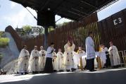 U.S. bishops, led by Cardinal Sean P. O'Malley of Boston, celebrates Mass at the border fence in Nogales, Ariz., in April. (CNS photo/Nancy Wiechec) 