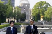 U.S. President Barack Obama delivers remarks, accompanied by Japanese Prime Minister Shinzo Abe at Hiroshima Peace Memorial Park in Hiroshima, western Japan. (AP Photo/Carolyn Kaster)