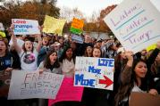 Demonstrators shout and hold signs in front of the White House in Washington Nov. 10 following President-elect Donald Trump's victory in the Nov. 8 election (CNS photo/Kevin Lamarque, Reuters).