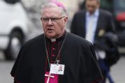 Archbishop Mark Coleridge of Brisbane, Australia, arrives for a session of the Synod of Bishops on the family at the Vatican Oct. 14. (CNS photo/Paul Haring) 