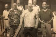 Edward Glynn, S.J., center, in Sea Bright, N.J., with his fellow Jesuits.