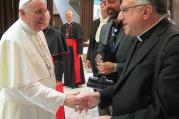 Pope Francis and Fr. Rosica, with Cardinal Donald Wuerl in the background.