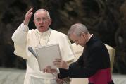 Pope Francis gives a blessing to the crowd during his weekly audience in Paul VI hall at the Vatican on Aug. 20. (CNS photo/Alessandro Bianchi, Reuters) 