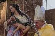 The rain falls as Pope Francis celebrates Mass adjacent to the airport in Tacloban, Philippines, in January. (CNS photo/Malacanang photo bureau handout via EPA)