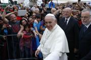 Pope Francis greets the crowd as he arrives to visit the Basilica of Santa Maria in Rome's Trastevere neighborhood on June 15. The pope visited members of the Community of Sant'Egidio.