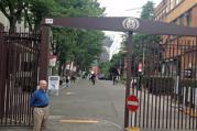 Fr. Bill Currie SJ at the entrance to the Sophia University in Japan