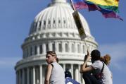 People gather near the U.S. Capitol during a gay rights demonstration in Washington, Oct. 11, 2009.