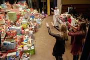 Priest leads blessing of Christmas gifts during the annual Mass at New York high school, 2013.