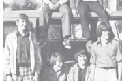 The author is on the van, at right