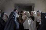 Lou De Laage, center, in "The Innocents" (image courtesy of Music Box Films).