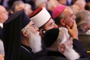 Guests of honor listen during the opening ceremony of the King Abdullah Bin Abdulaziz International Center in Vienna Nov. 2012