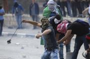 Palestinian protesters clash with Israeli soldiers in Bethlehem, West Bank, Oct. 6. Violence in Israel and the West Bank has increased in October.(CNS photo/Abed Al Haslhamoun, EPA) 
