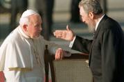 Cuban President Fidel Castro gestures to Pope John Paul II in Havana in 1998. It was the first visit to Cuba by a pope, and the Polish pontiff used it to appeal for greater religious rights. (CNS photo/Reuters) 