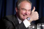 In this Feb. 4, 2016, file photo, Sen. Tim Kaine, D-Va., gives a 'thumbs-up' as he takes his seat at the head table for the National Prayer Breakfast in Washington. (AP Photo/Pablo Martinez Monsivais, File)