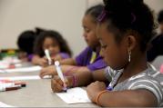 Children decorate a paper tiaras during the Military Child Education Coalition's, Tell Me a Story event, in the Warrior Hope and Care Center at Camp Pendleton Calif. By Cpl. Sarah Wolff, via Wikimedia Commons 