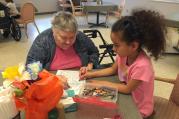 Mandy visiting a resident of the local nursing home