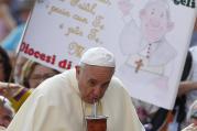 My Mate: Pope Francis drinks mate, the traditional Argentine herbal tea, as he arrives to lead his general audience in St. Peter's Square at the Vatican Aug. 27. The tea was presented by someone in the crowd. (CNS photo/Paul Haring)