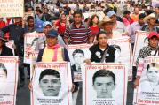 Parents of 43 missing Mexican students of the Ayotzinapa teachers' college near Chilpancingo, Mexico, participate in a 2015 protest in Mexico City. (CNS photo/Mario Guzman, EPA)