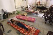 An Iraqi Christian family fleeing the violence in Mosul sleeps inside Sacred Heart of Jesus Chaldean Church in Telkaif, Iraq, Mosul July 20. Pope Francis called for prayers, dialogue, and peace, as the last Iraqi Christians flee Mosul. 