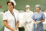 Collateral Damage: Marcia Gay Harden, left, and Zac Efron, center, in 'Parkland'