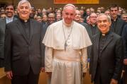 Arturo Sosa, S.J., left, the new superior general of the Jesuits, and Orlando Torres, S.J., stand with Pope Francis at a meeting of GC 36 on Oct. 24 (photo courtesy GC 36).