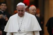 Pope Francis leaves the concluding session of the extraordinary Synod of Bishops on the family at the Vatican Oct. 18. (CNS photo/Paul Haring)