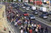 Migrants walk along a highway in Bicske, Hungary, near the border with Austria Sept. 4. (CNS/Bernadett Szabo, Reuters) 