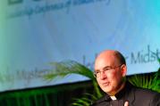Achbishop J. Peter Sartain of Seattle attends a meeting of the Leadership Conference of Women Religious in Nashville, Tenn., last year. (CNS photo/Andy Telli, Tennessee Register)