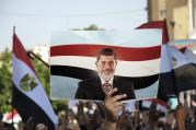 NOT FORGOTTEN: A protester raises a sign in support of deposed president Mohamed Morsi on June 21, 2013.