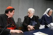 Cardinal Braz de Aviz speaks with Sister Holland at conclusion of Vatican press conference for release of final report of Vatican-ordered investigation of U.S. communities of women religious, Dec. 16 (Paul Haring, CNS photo).
