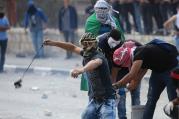 TENSIONS MOUNT. Palestinian protesters clash with Israeli soldiers in Bethlehem, West Bank, on Oct. 6.