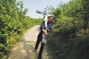 CROSS TO BEAR: A Chinese Catholic carries a crucifix during a pilgrimage in the Shanxi province of China in 2013.